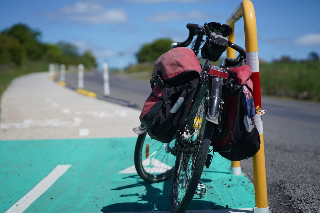 bikepacking bike leaning on a handrail